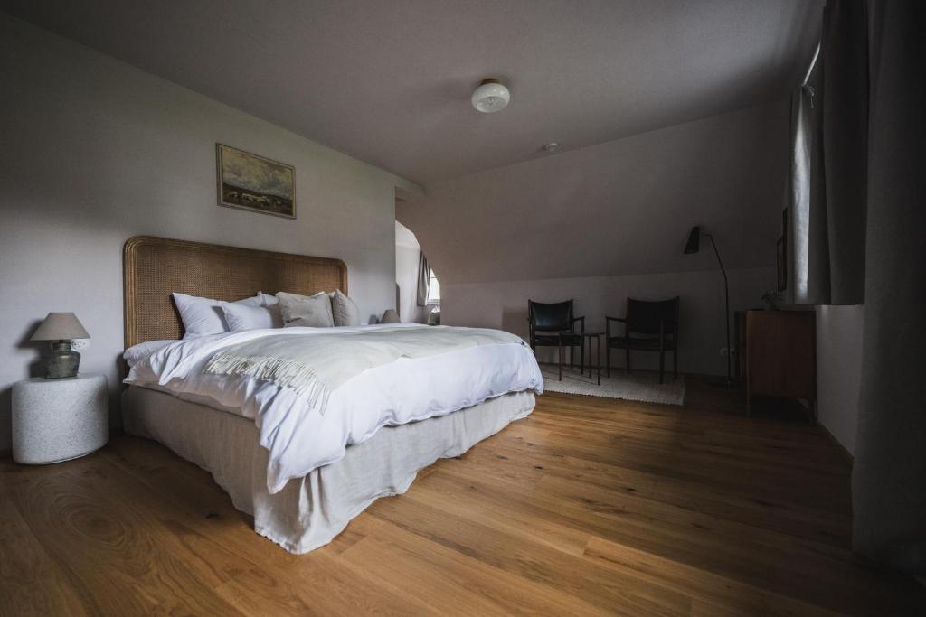 Postel nebo postele na pokoji v ubytování theoldschool guesthouse