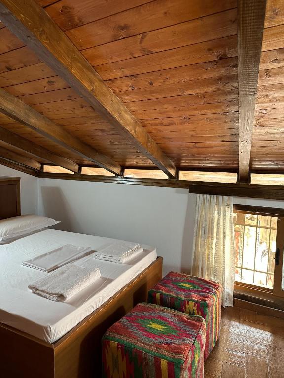 Postel nebo postele na pokoji v ubytování Old Bazaar House
