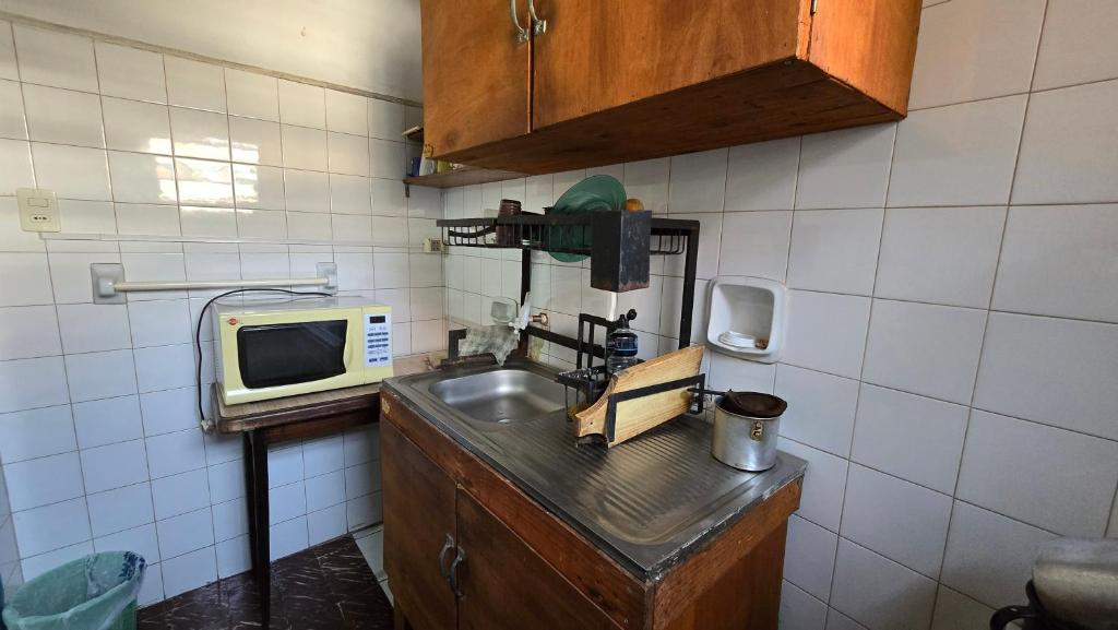 O bucătărie sau chicinetă la Tagua Hospedaje