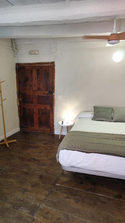 Postel nebo postele na pokoji v ubytování Maison del Arc
