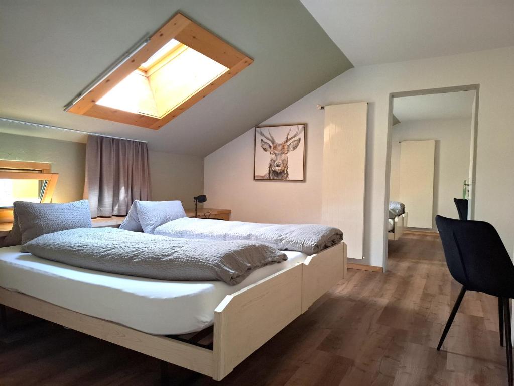 Postel nebo postele na pokoji v ubytování Hotel Alpina