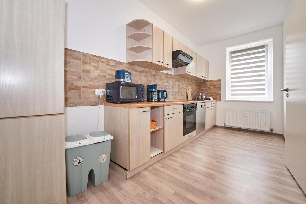 Kuchyň nebo kuchyňský kout v ubytování Monteurwohnung Glauchau