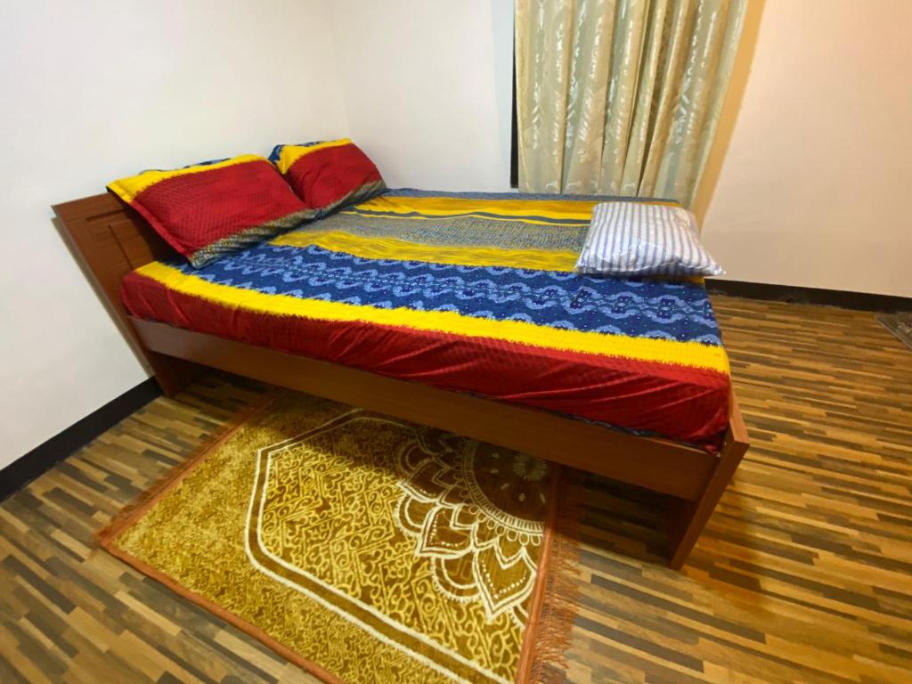 Postel nebo postele na pokoji v ubytování Queen's Mahal Rooms