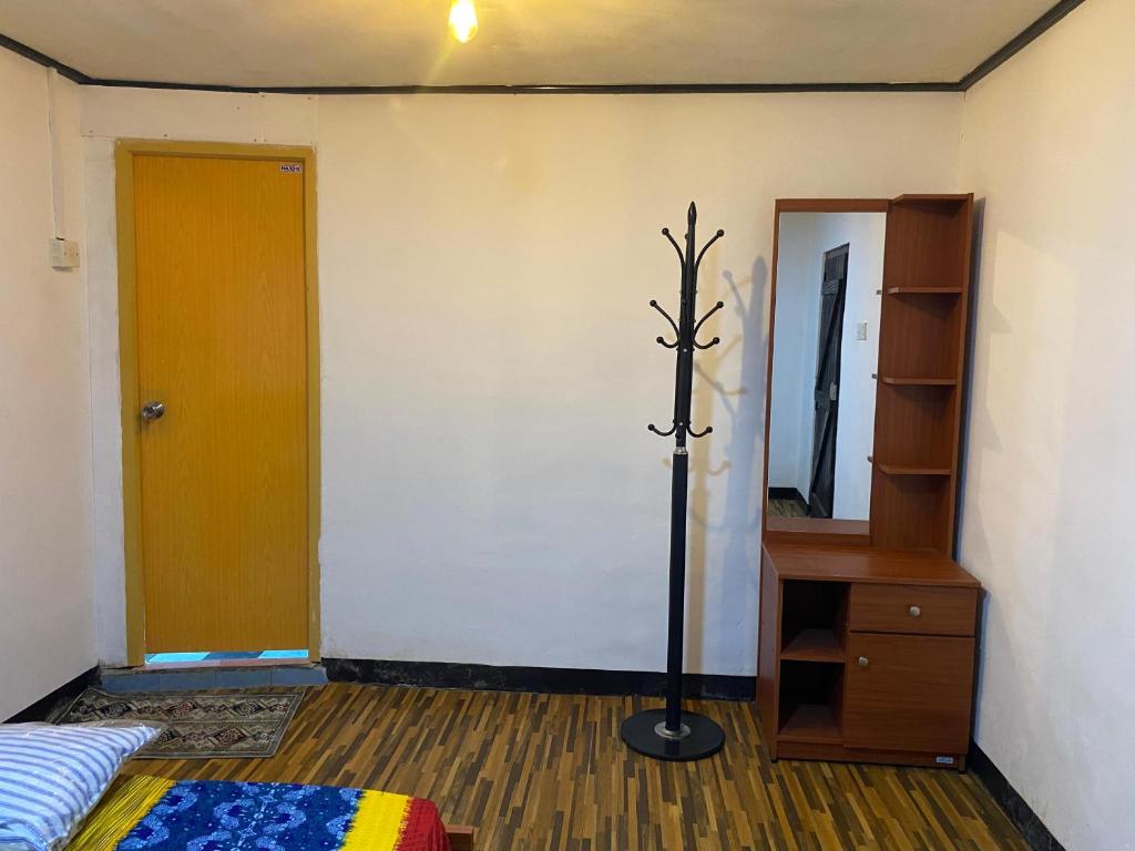 Postel nebo postele na pokoji v ubytování Queen's Mahal Rooms