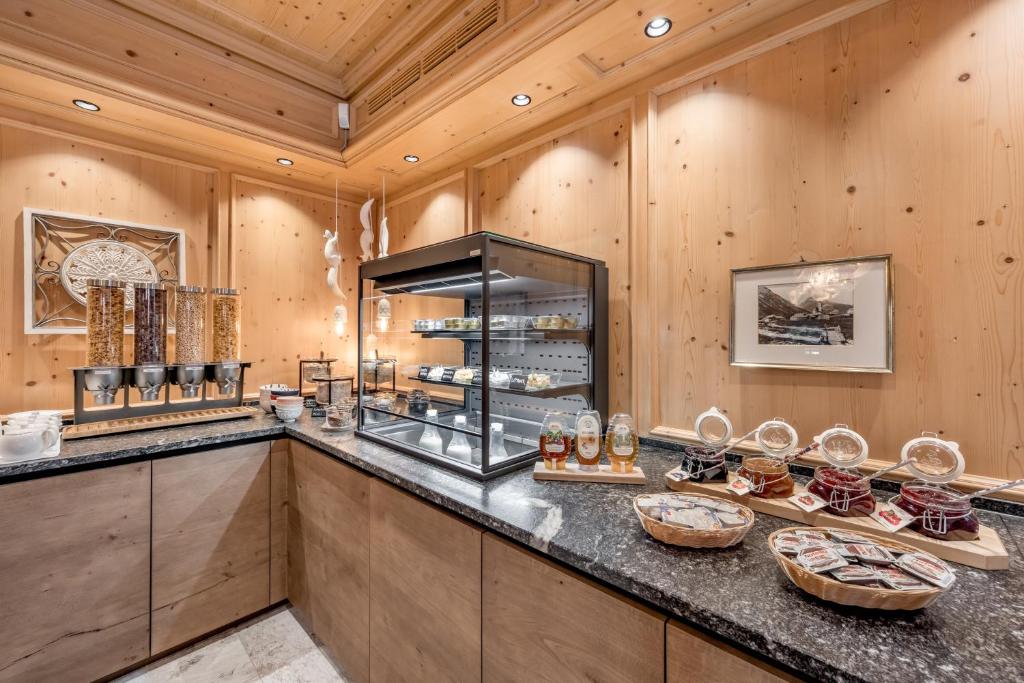 Kuchyň nebo kuchyňský kout v ubytování Hotel Rössle Superior
