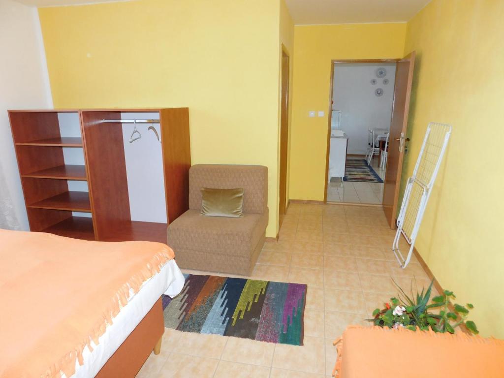 Postel nebo postele na pokoji v ubytování Apartmany Tania