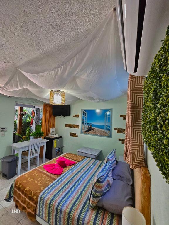 Postel nebo postele na pokoji v ubytování BellaVista Suites By Villas Verdes - Samara Beach