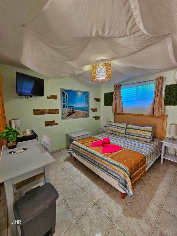 Postel nebo postele na pokoji v ubytování BellaVista Suites By Villas Verdes - Samara Beach
