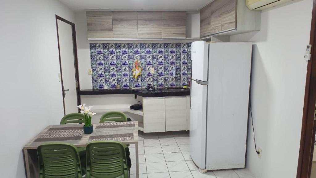 Η κουζίνα ή μικρή κουζίνα στο Localização Espetacular - Zona Norte - Sem Taxas