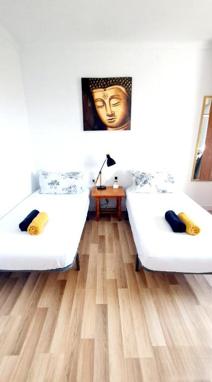 Posteľ alebo postele v izbe v ubytovaní Casa Ridao-Habitación Buddha con vistas