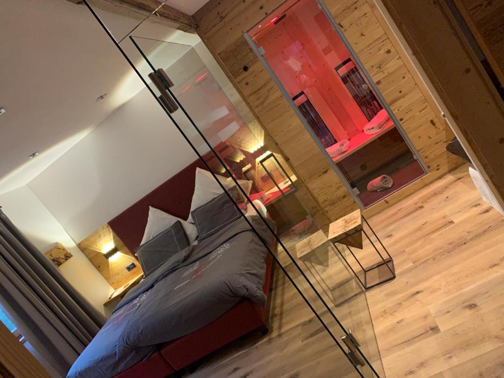 Postel nebo postele na pokoji v ubytování Luxury Chalet Orchidea