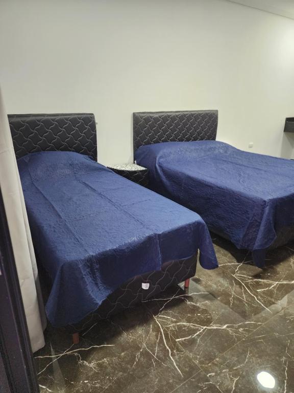 Postel nebo postele na pokoji v ubytování Hospedaje Santa Sofía
