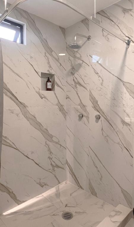 Koupelna v ubytování Suites ciento 37