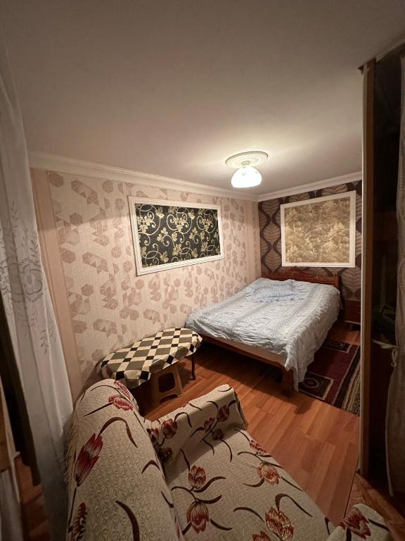 Postel nebo postele na pokoji v ubytování Guest House Iura