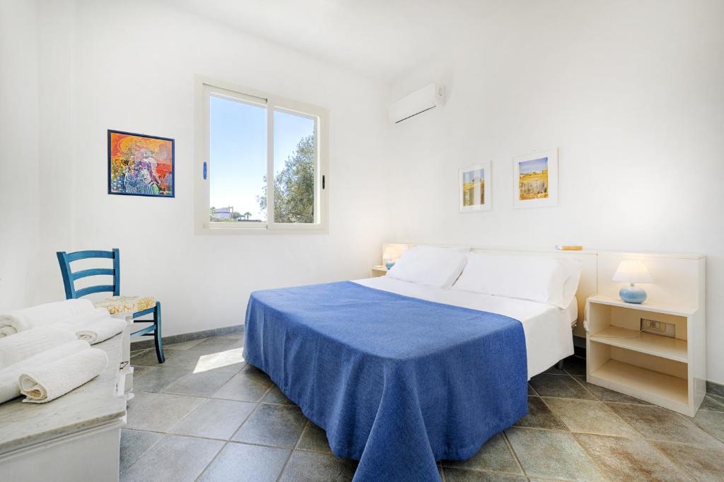 Postel nebo postele na pokoji v ubytování Villa GIO'