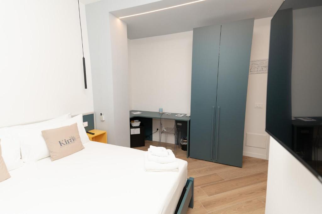 Postel nebo postele na pokoji v ubytování Kira suite and rooms