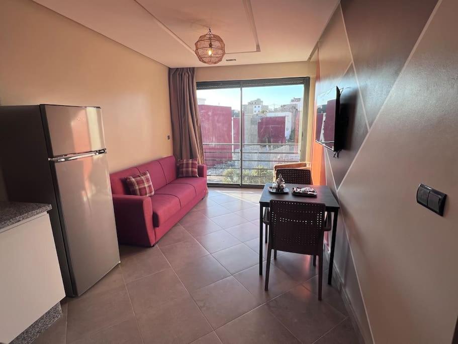 Kuchyň nebo kuchyňský kout v ubytování Appartement No 4 vue sur mer au loin