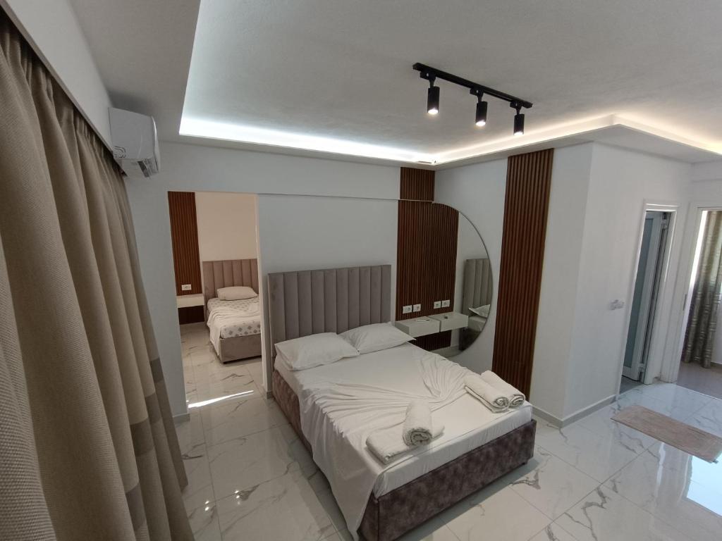 Postel nebo postele na pokoji v ubytování Hotel Elisabet