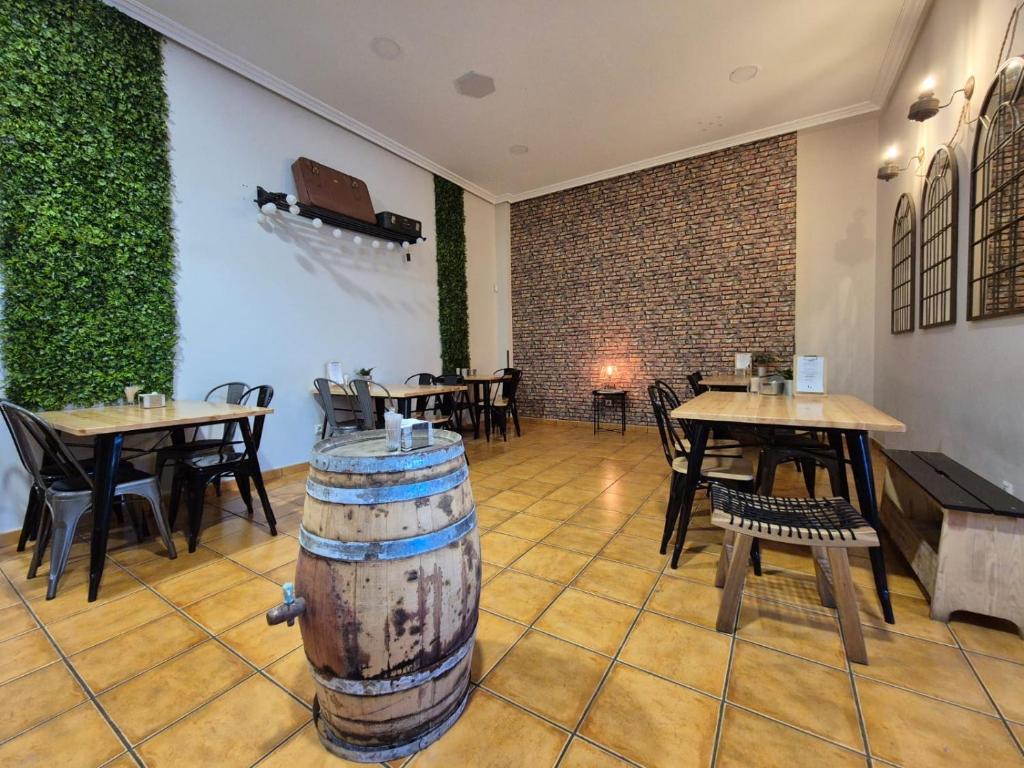 A restaurant or other place to eat at Hostal Galicia