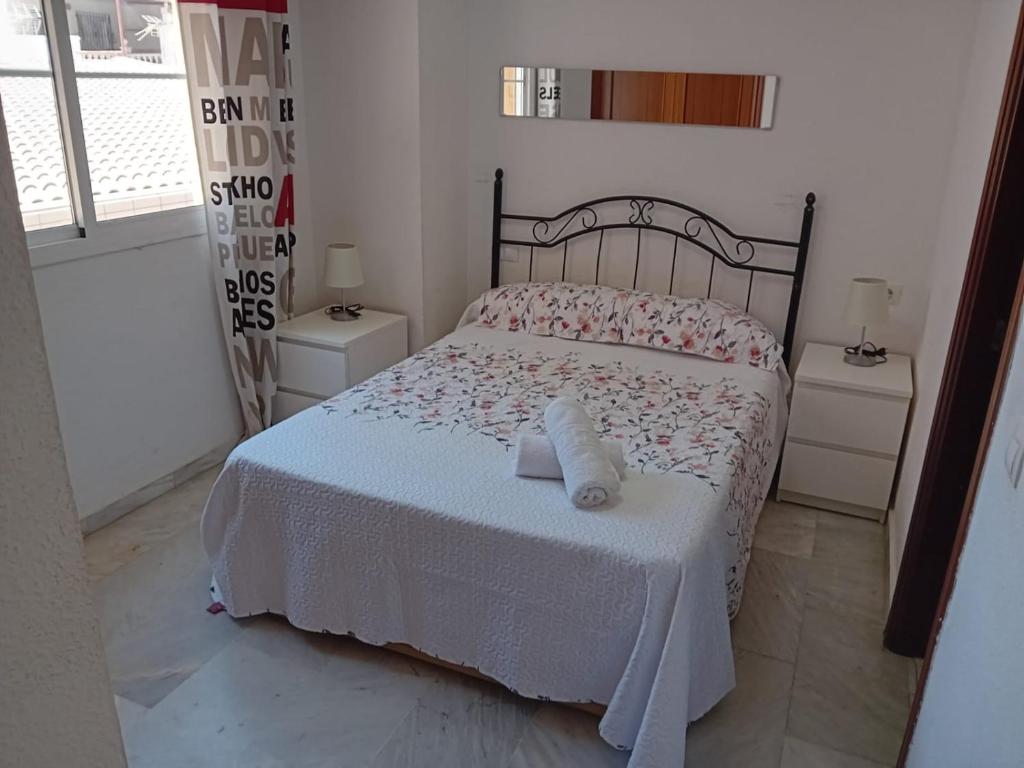 A bed or beds in a room at Apartamento Sostoa 1