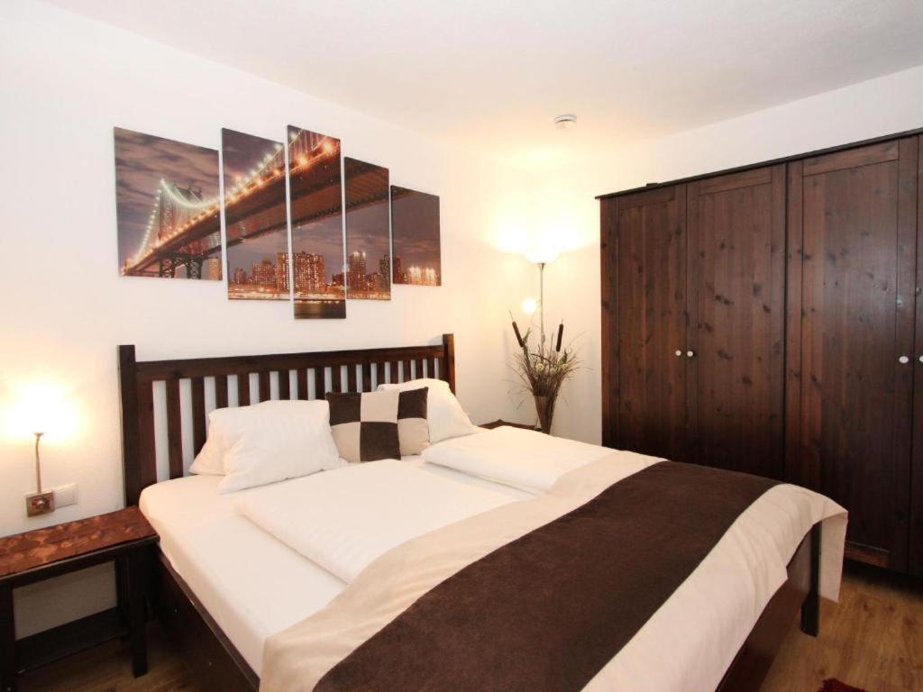 Postel nebo postele na pokoji v ubytování Appartement Alpina Zillertal
