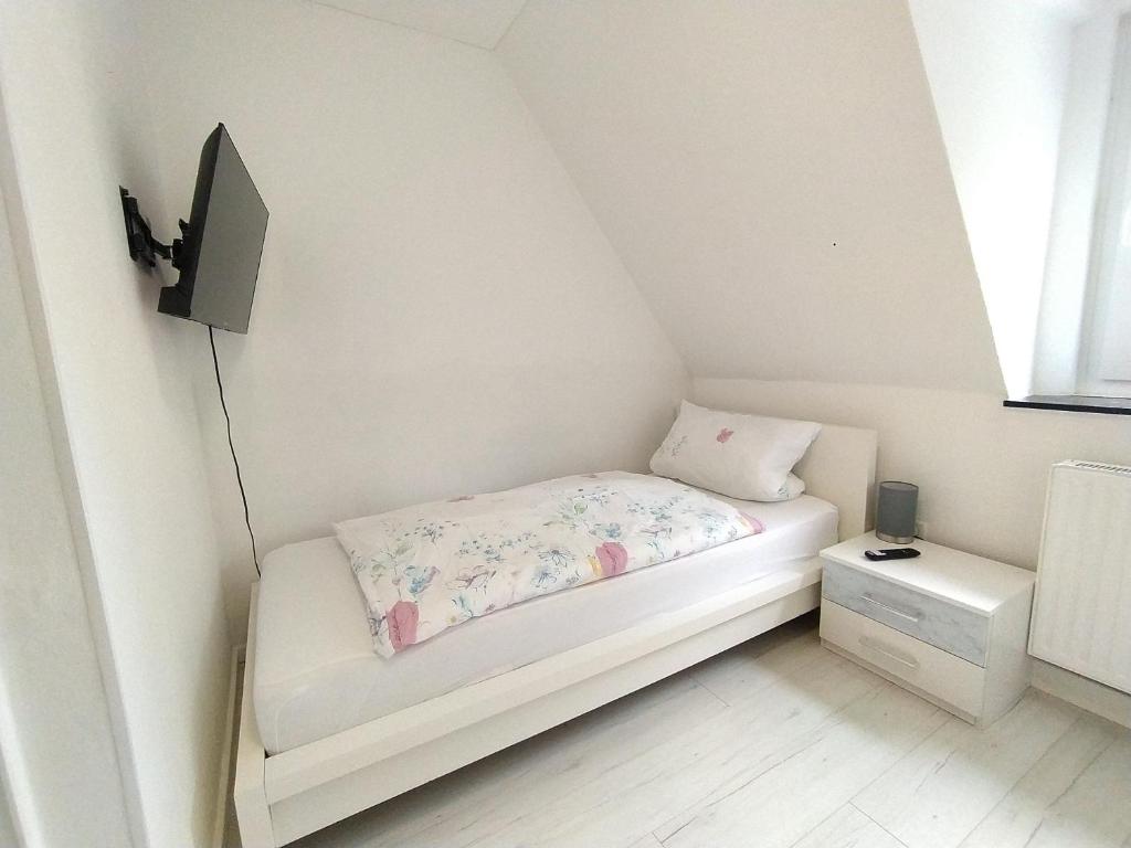 Postel nebo postele na pokoji v ubytování Ruhe am Walde