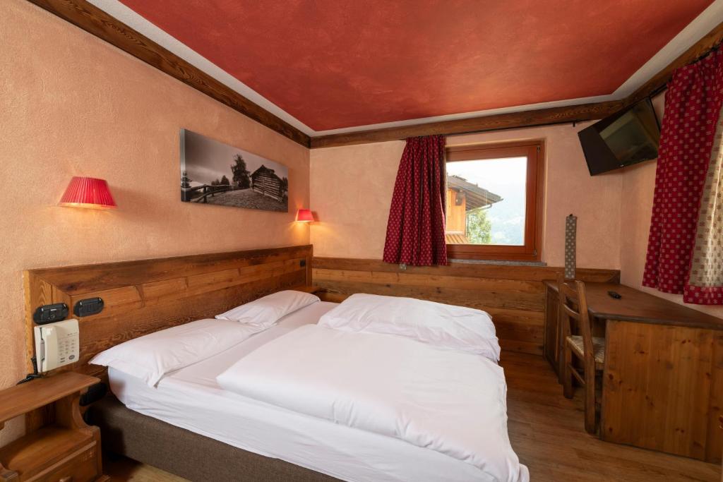 Postel nebo postele na pokoji v ubytování Maison de leon