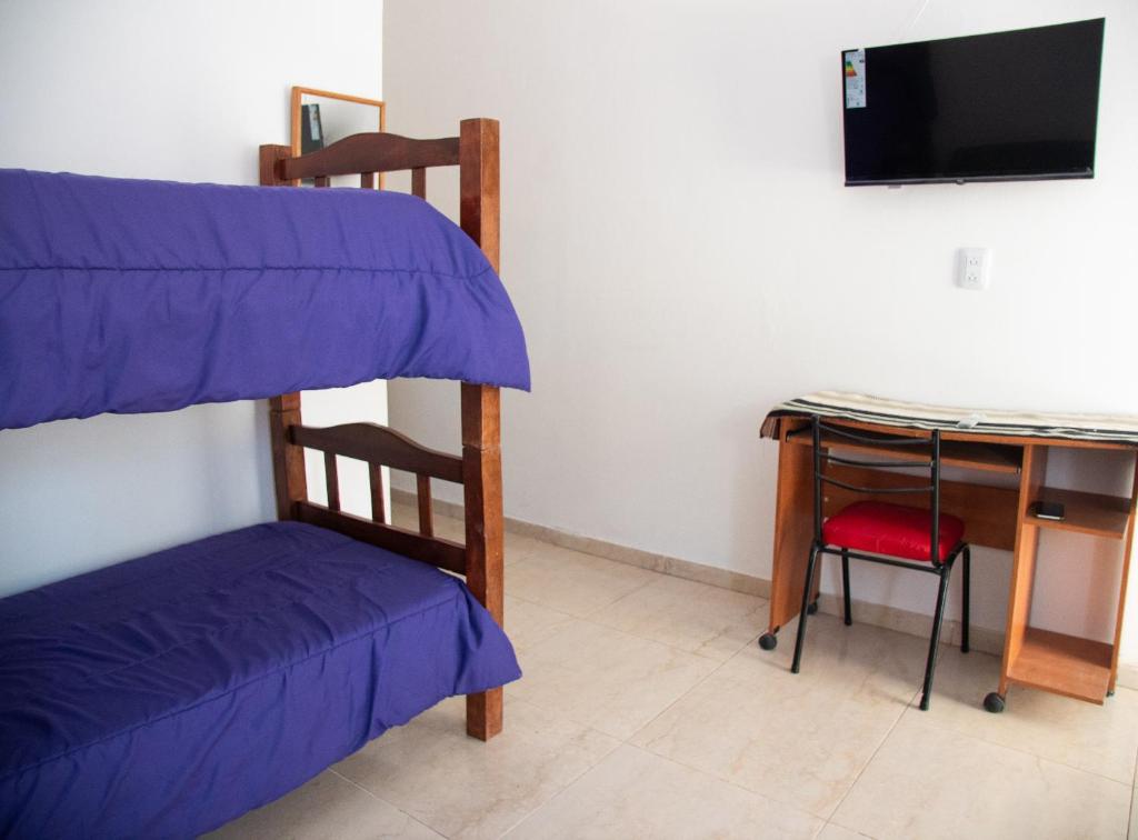 Postel nebo postele na pokoji v ubytování GOa Hospedajes
