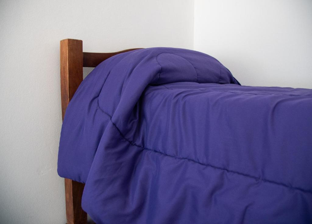 Postel nebo postele na pokoji v ubytování GOa Hospedajes