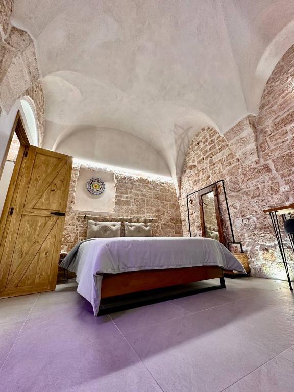 Postel nebo postele na pokoji v ubytování Primus Suite