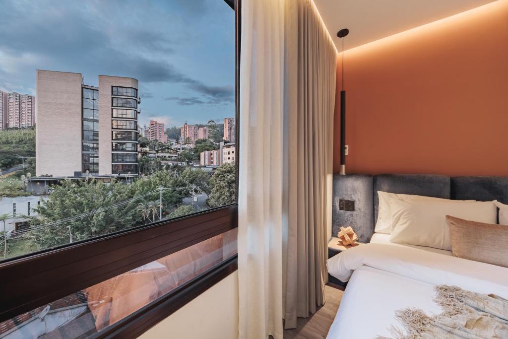 Postel nebo postele na pokoji v ubytování Nock - Reserved Residences