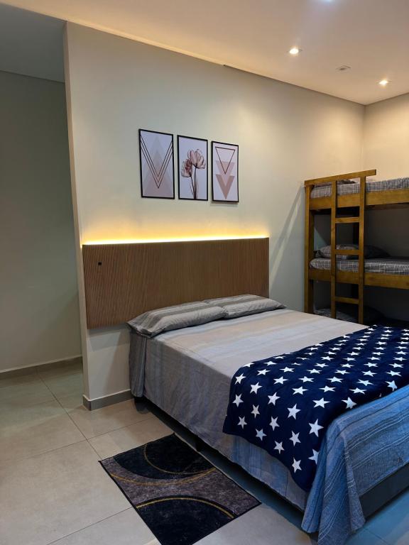 Postel nebo postele na pokoji v ubytování Guaru Inn Hostel