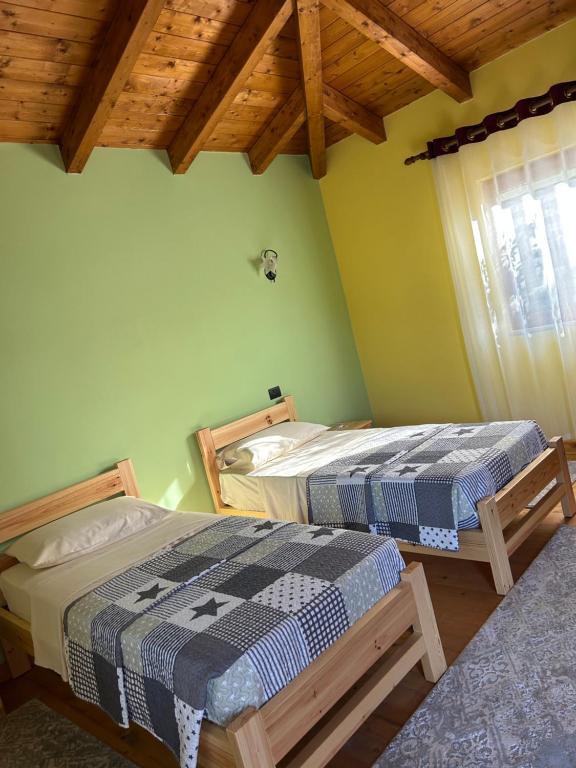 Postel nebo postele na pokoji v ubytování Hani i Leks Agroturizem