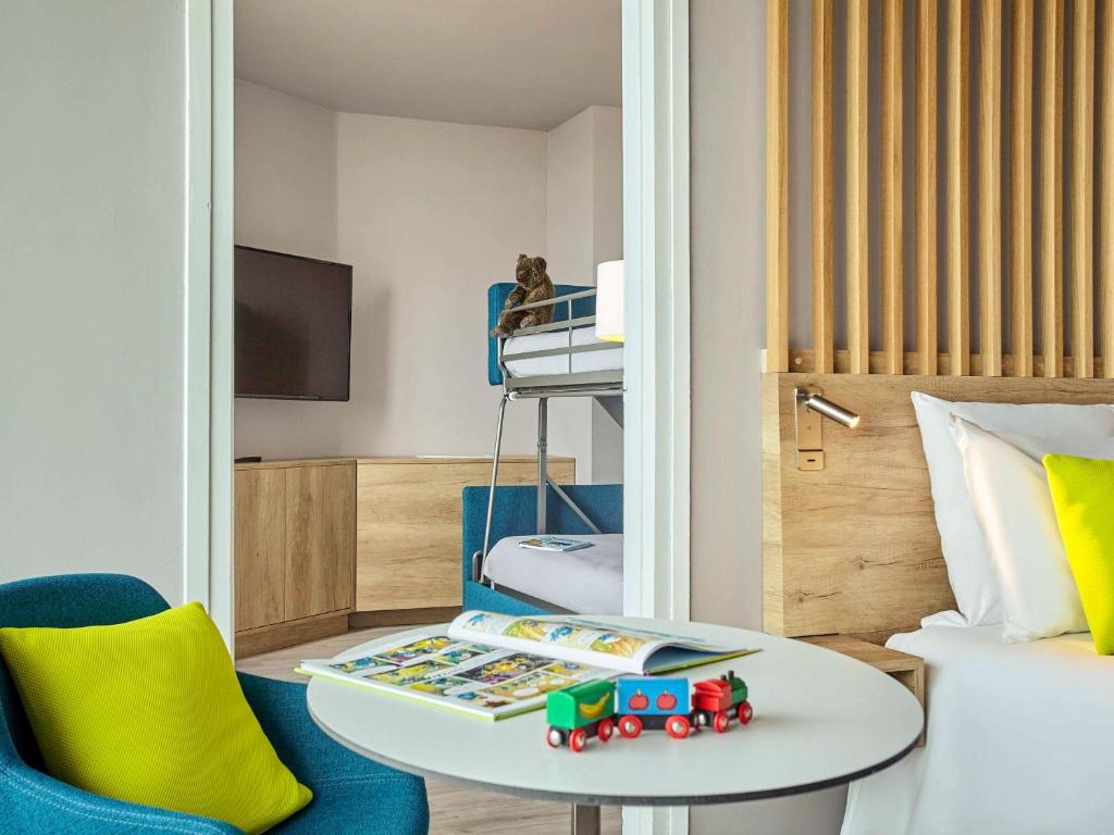 TV a/nebo společenská místnost v ubytování Novotel Thalassa Le Touquet