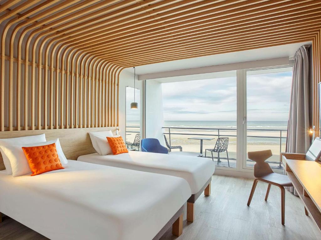 Postel nebo postele na pokoji v ubytování Novotel Thalassa Le Touquet