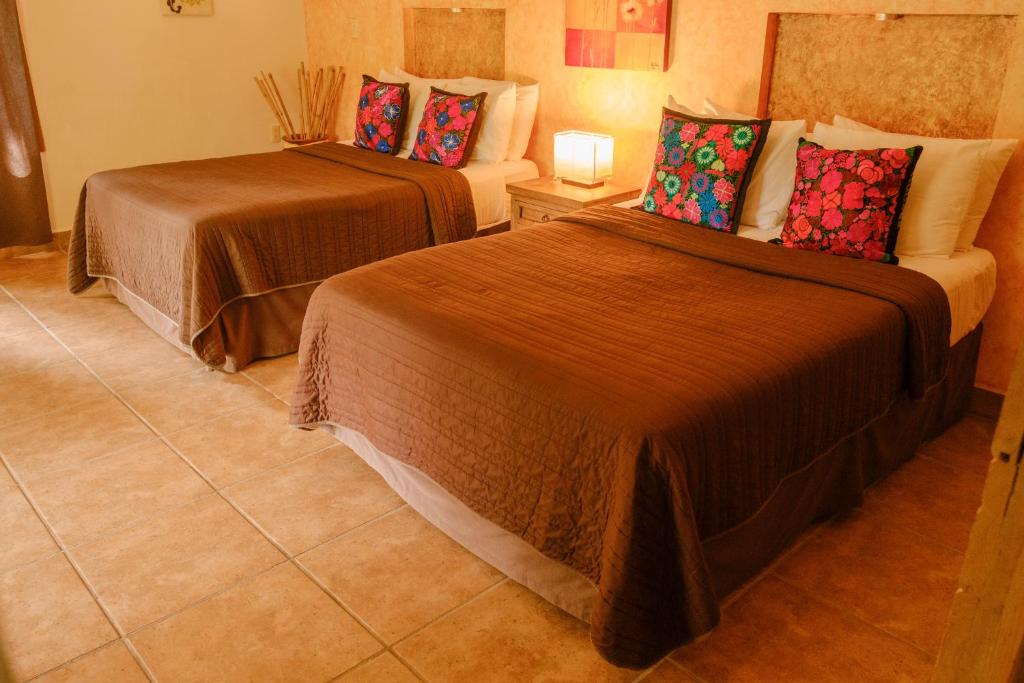 Postel nebo postele na pokoji v ubytování Argovia Ecolodge
