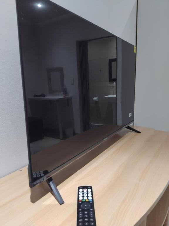 TV a/nebo společenská místnost v ubytování Klerksdorp Flamwood Central Apt