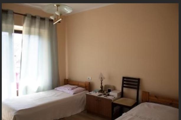 Postel nebo postele na pokoji v ubytování Pogradec Central Apartment
