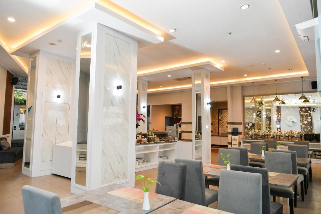 Posezení v ubytování Front One HK Resort Simpang Lima