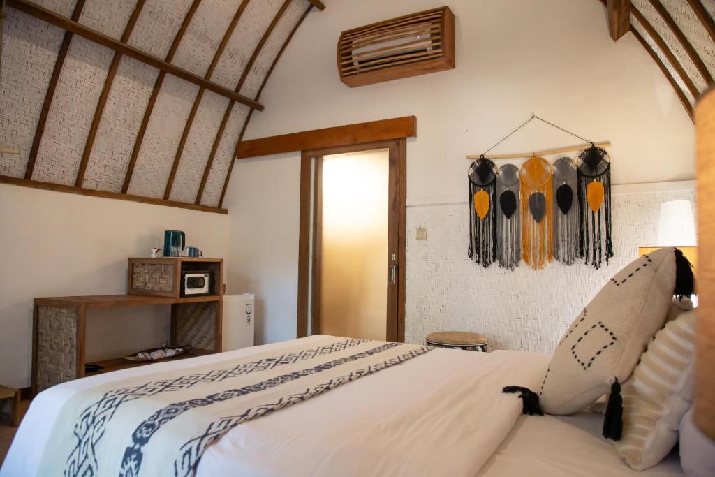 Postel nebo postele na pokoji v ubytování VILLA BAGUS - adults only hideaway