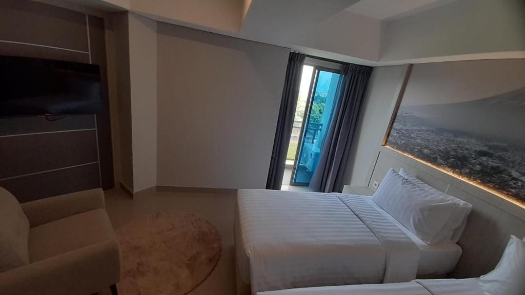 Posezení v ubytování Nemuru Grand Suites