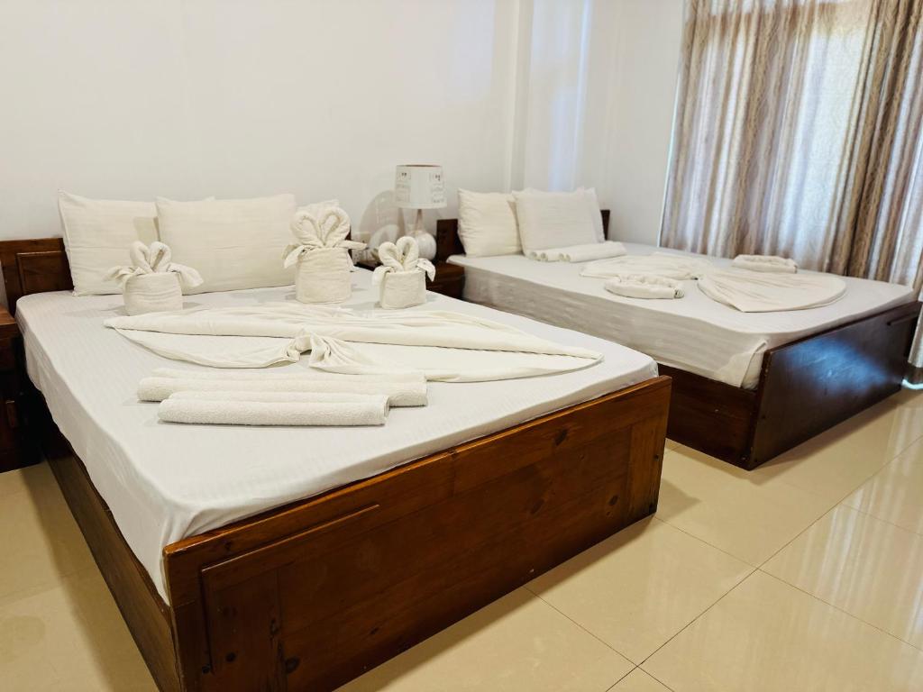 Postel nebo postele na pokoji v ubytování Gamodh Citadel Resort