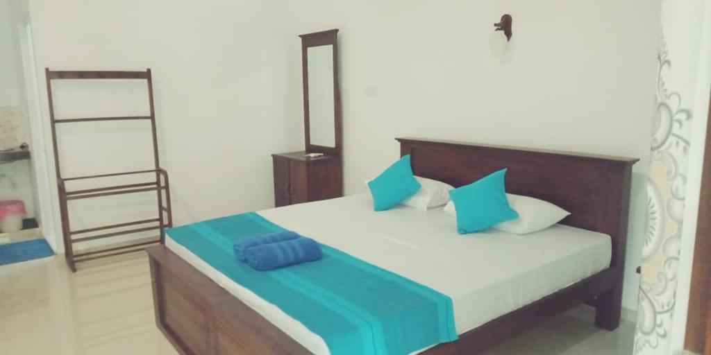 Postel nebo postele na pokoji v ubytování Hiru Resort Inn