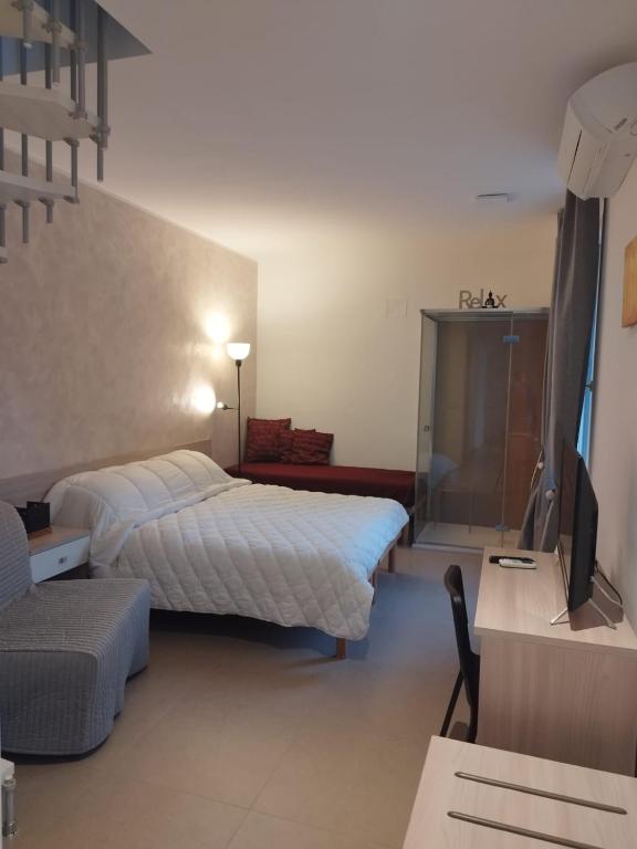 A bed or beds in a room at Agriturismo La dimora dei Re