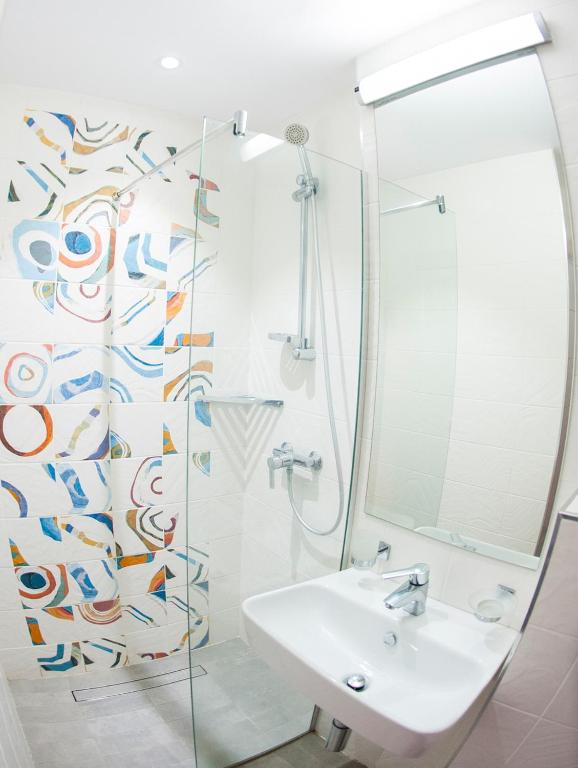 Koupelna v ubytování Hotel Favorit