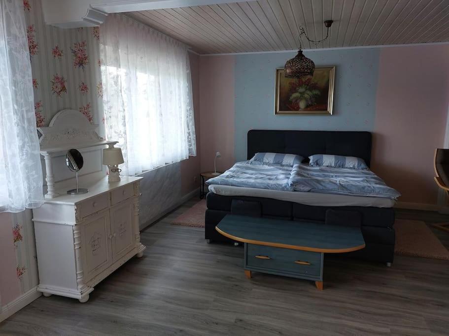 Postel nebo postele na pokoji v ubytování Hotel MOMA