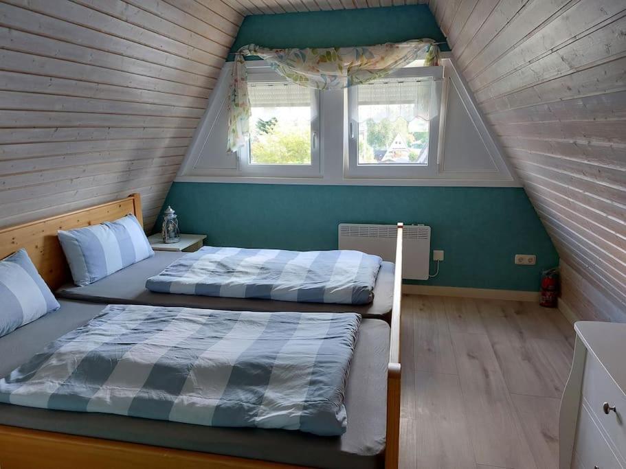 Postel nebo postele na pokoji v ubytování Hotel MOMA