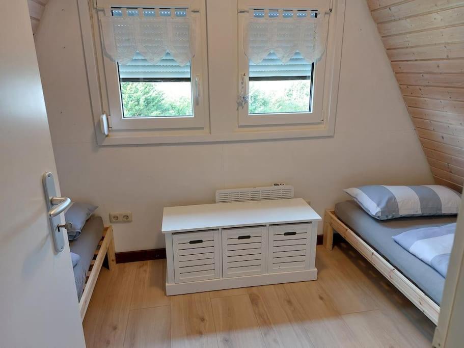 Postel nebo postele na pokoji v ubytování Hotel MOMA