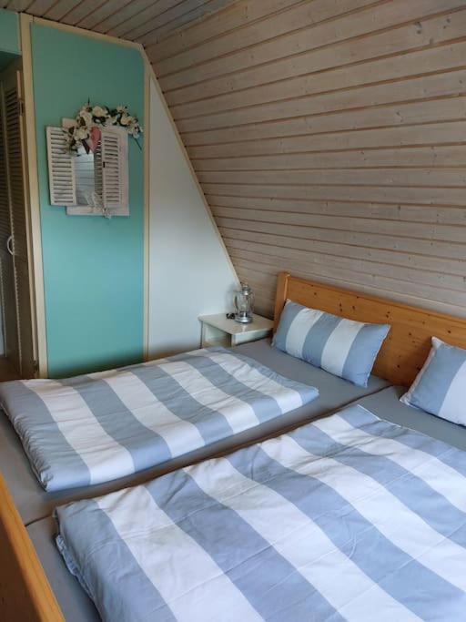 Postel nebo postele na pokoji v ubytování Hotel MOMA