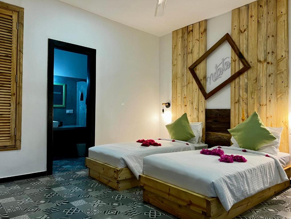 Postel nebo postele na pokoji v ubytování Opera Hotel